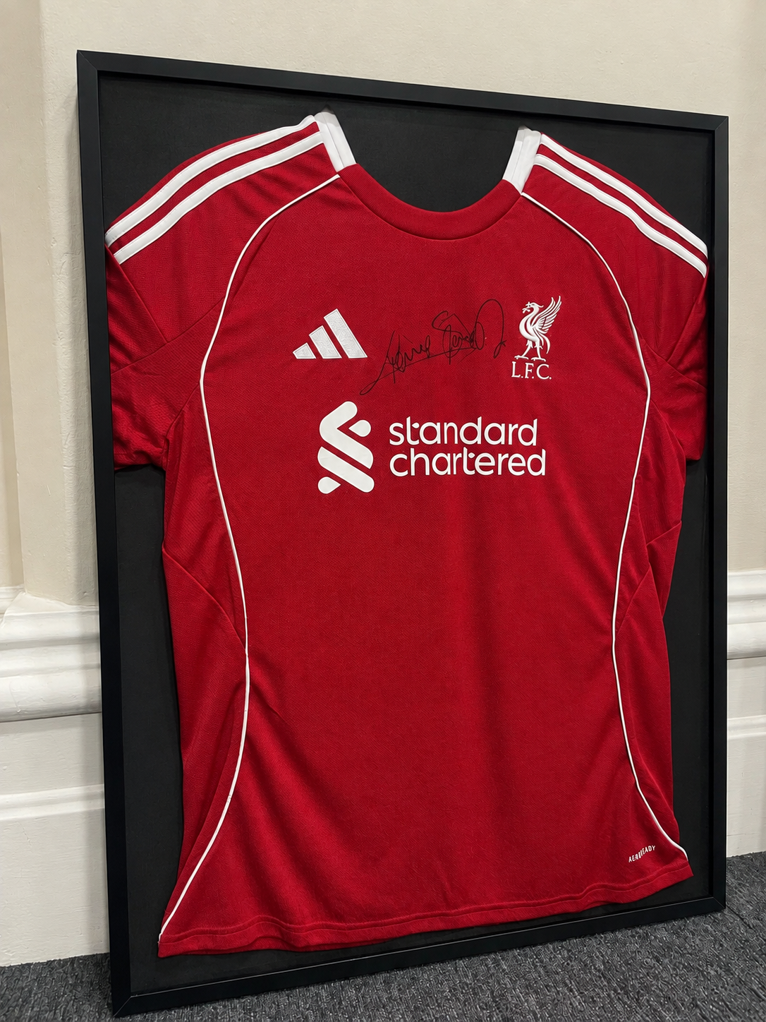Liverpool FC shirt signed by Graeme Souness CBE, presented in a black frame
